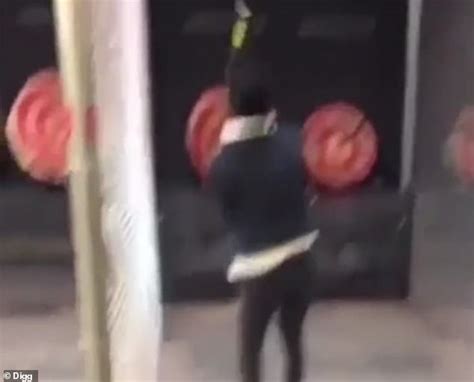 Shocking moment hatchet bounces back and almost hits reveler | Daily ...