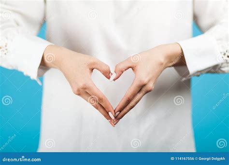 hands showing heart sign stock photo image  background