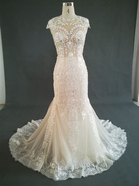 Cap sleeve lace wedding gown with illusion bodice