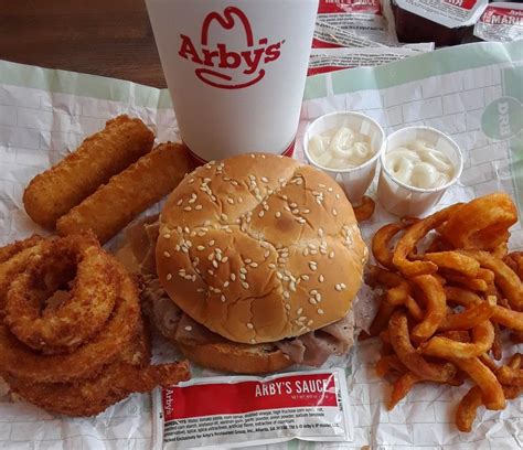 arbys roast beef sandwich meal  curly fries  cheese sticks
