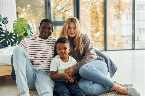 Mixed race family together 16937641 Stock Photo at Vecteezy