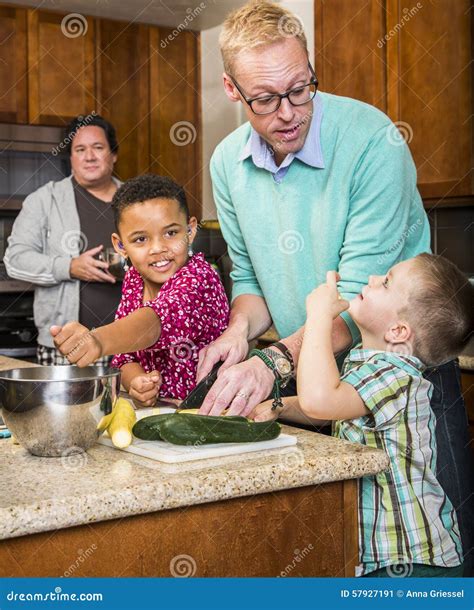 Same Sex Couple with Kids in Kitchen Stock Image - Image of diverse