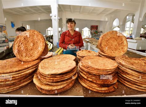Uzbek bread in the food market. Bukhara, a UNESCO World Heritage Site ...