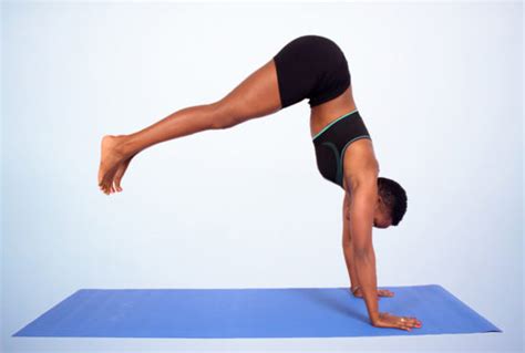 woman  beginner handstand yoga pose  yoga mat high quality