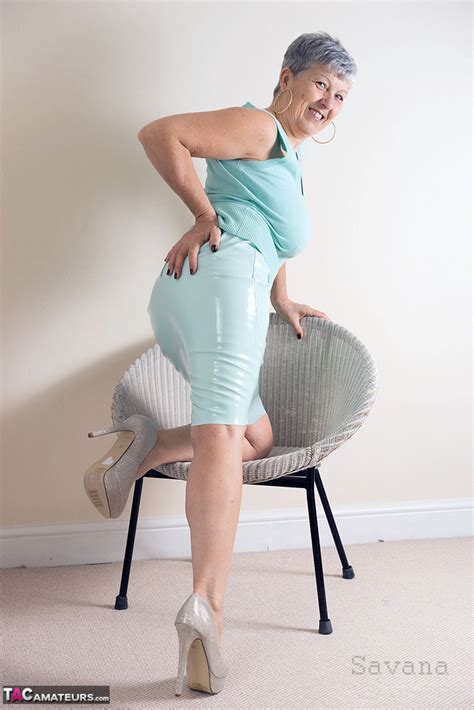 White granny Savana flashes no panty upskirts before exposing a big
