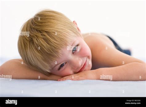 boy laying  floor stock photo alamy