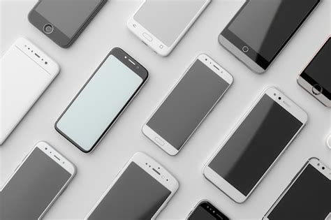 multiple modern smartphones arranged   angles   white