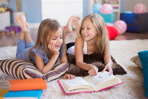 Free Photo | One book and two girls