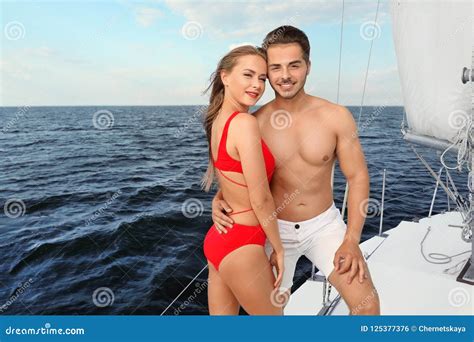 Young Man and His Beautiful Girlfriend in Bikini Stock Photo - Image of ...