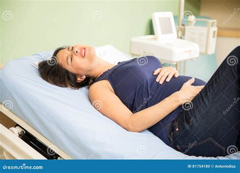 Pregnant Woman Going into Labor Stock Photo - Image of pretty, space ...