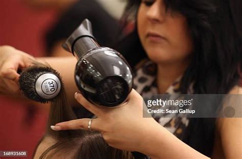 Friseur Friseur Hairdresser Photos and Premium High Res Pictures ...