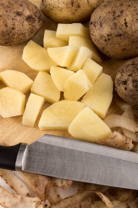 Into Small Dice Cut Organic Potatoes Stock Photo - Image of peel ...