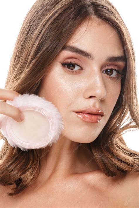 Premium Photo | Portrait of gorgeous half-naked woman applying makeup