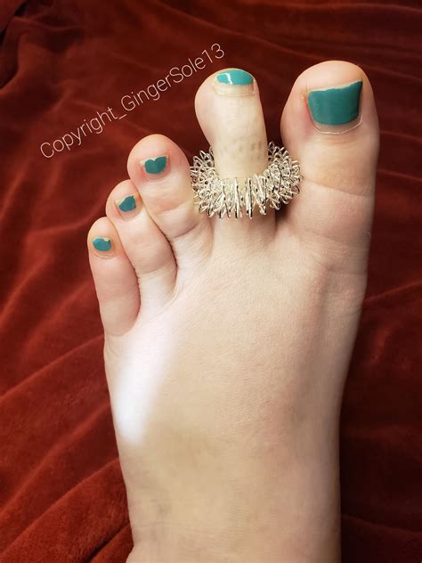 Massaging my long toes with a new acupressure toe ring! : r/bigfeetgirls