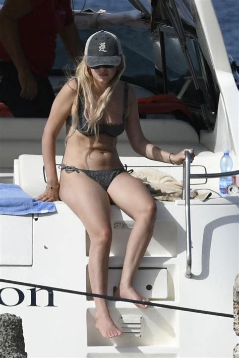 MILLIE BOBBY BORWN in Bikini at Boat in Sardinia 07/06/2022 – HawtCelebs