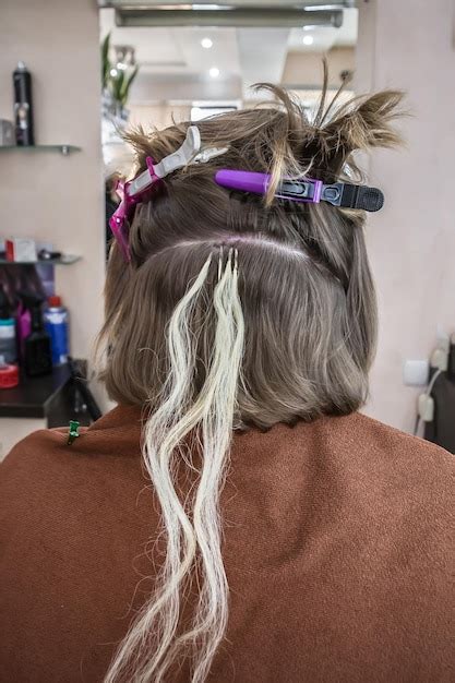 Premium Photo | Hair extensions in a beauty salon