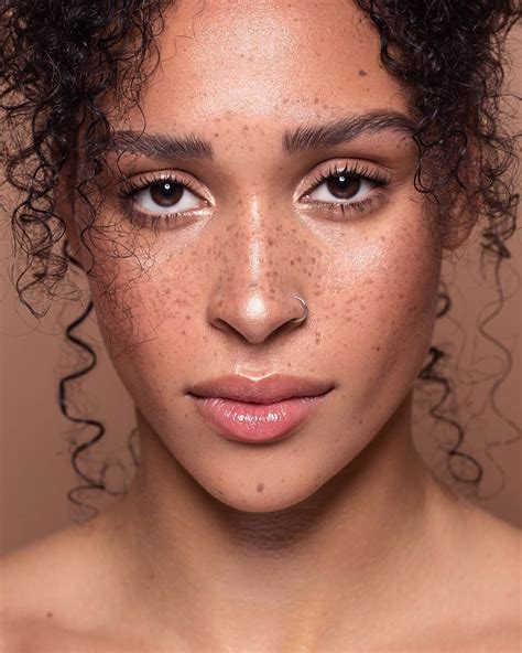 embracing  beauty  freckles  tan skin
