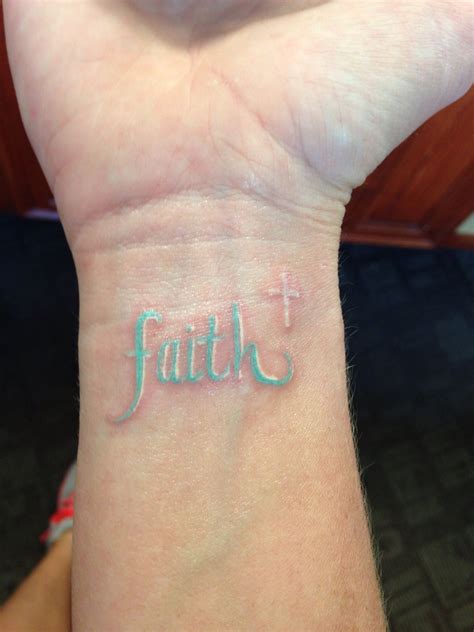 cross tattoo in wrist 3