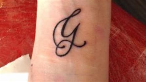 Cursive Letter G Tattoo