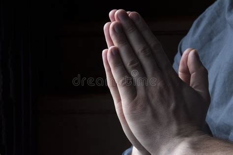 hands folded  prayer hands   man  man  praying stock image