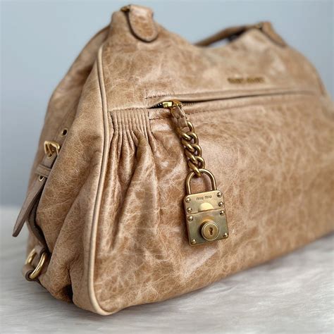 Miu Miu Beige Leather Charm Detail 2 Way Shoulder Bag – Luxury Trade