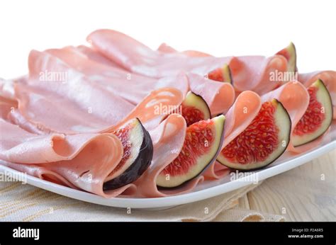 fine italian mortadella sausage  fresh figs stock photo alamy
