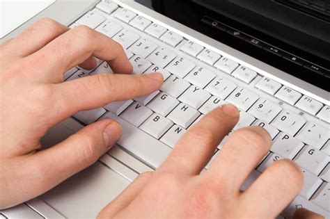 Premium Photo | Using a laptop
