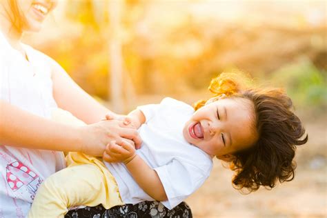 Woman Holding Baby Smiling · Free Stock Photo