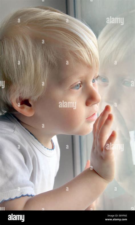 boy gaze window  res stock photography  images alamy