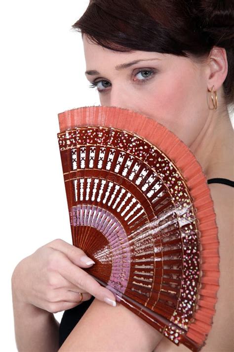 Woman holding a fan stock image. Image of 3035, face - 27809993