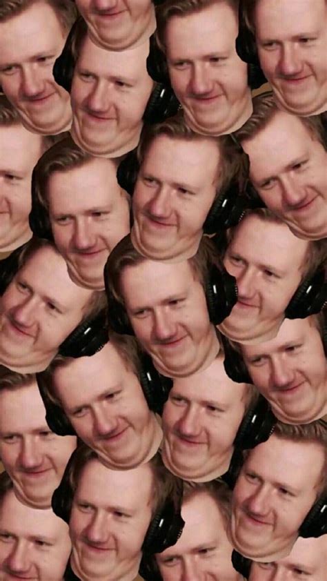 many faces are shown with the same man's face as he appears to be smiling