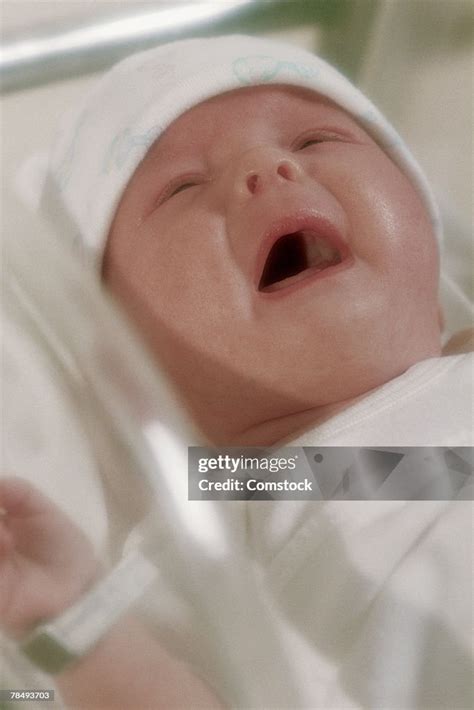 Newborn Baby Crying High-Res Stock Photo - Getty Images