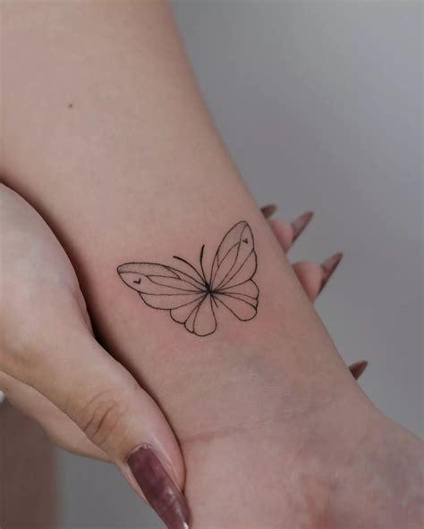 butterfly wrist tattoo 10