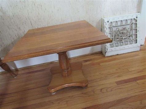 Wooden pedestal table