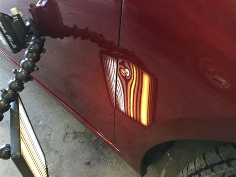 how to fix a dent in a fender