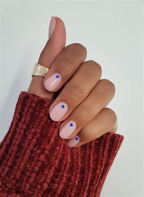 Nude pink nails with blue dots – Artofit