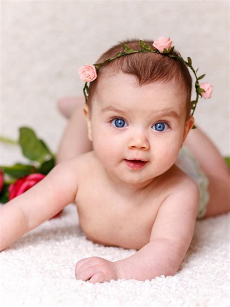 charming baby girl  floral headband radiates innocence