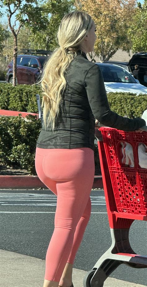 Gorgeous blonde milf with a MASSIVE plump ass in pinkish leggings