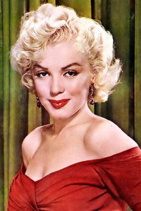Marilyn Monroe citát: „Rozhodně jsem ženou a užívám si to.“