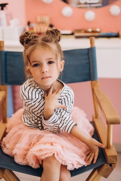 Premium Photo | Portrait of a little beautiful girl with a stylish ...
