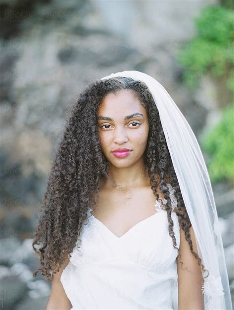 "Beautiful Black Bride On Beach In Gorgeous Wedding Gown With Rocks And