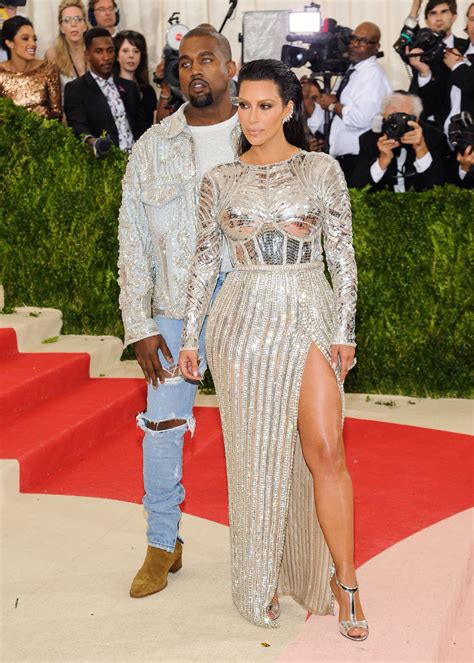 PARIS DUNN — Kim Kardashian and Kanye West attend the “Manus x...