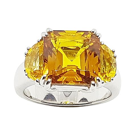 Blue Sapphire with Yellow Sapphire Ring Set in Platinum 900 Settings