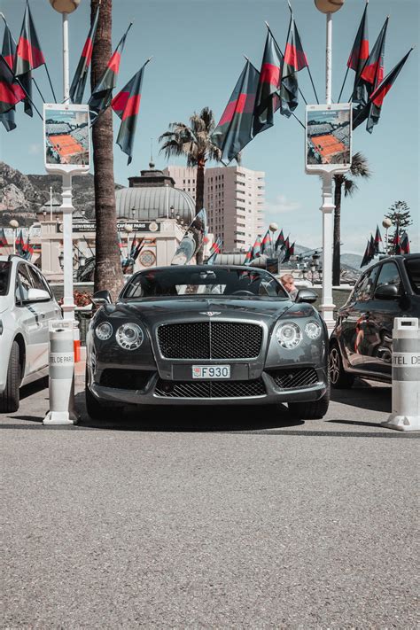 Download Bentley On Parking Lot Wallpaper | Wallpapers.com