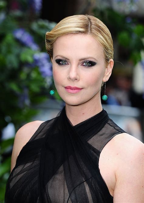 CHARLIZE THERON at Snow White and the Huntsman Premiere in London