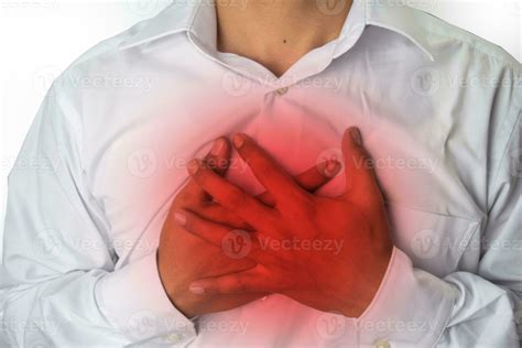 man chest pain from acid reflux or heartburn, isolated on white