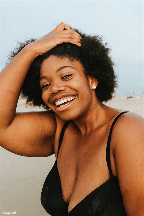 Beautiful plus size African American woman at the beach | premium image ...