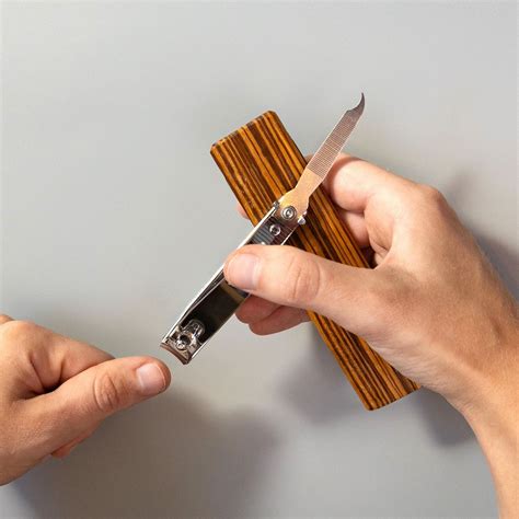 Pivoting Fingernail Clippers on Zebra Wood Base | Hand Mobility Aid for