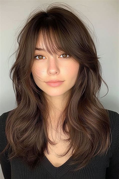 curtain bangs  layered long hair soft brunette layers