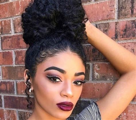 20 Amazing Curly Bun Hairstyles to Stand Out (2024 trends)